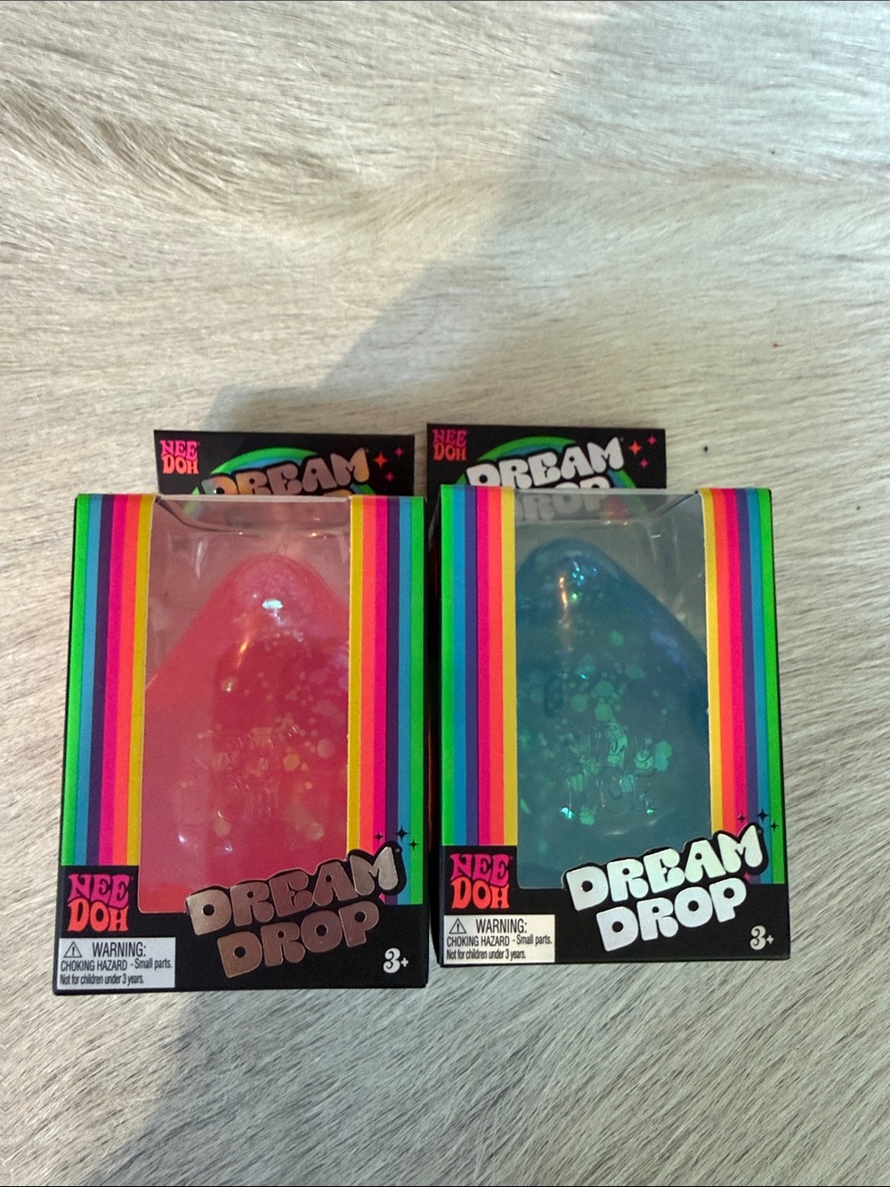 Authentic Schylling NeeDoh pair of Dream Drops in Pink and blue